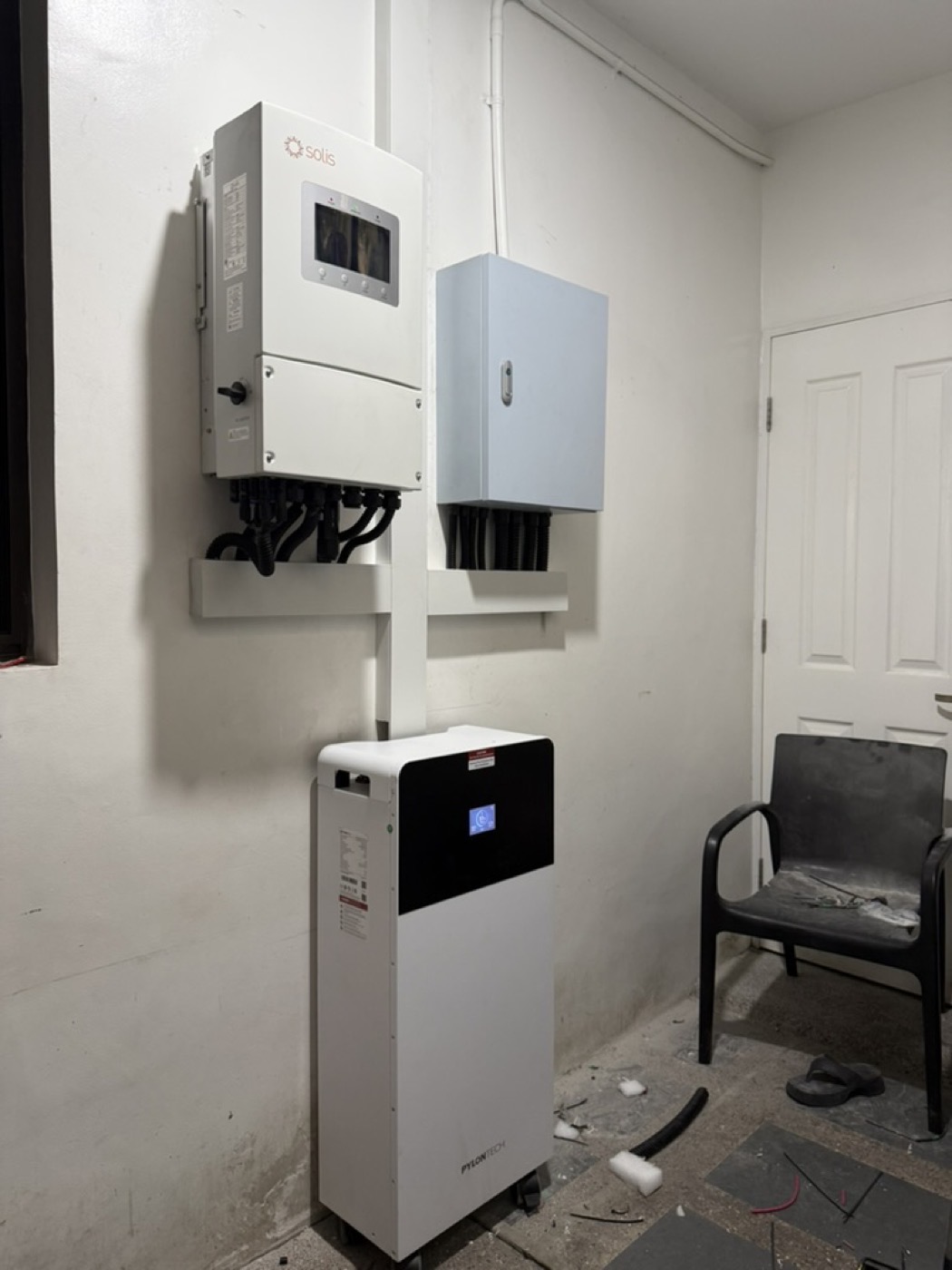 Hybrid inverter and battery bank installed indoors, the equipment that keeps power on during a brownout